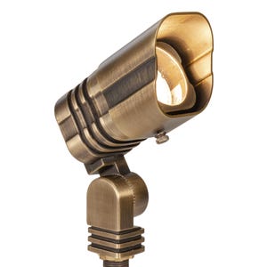 VOLT® MR16 Lusitano brass spotlight with adjustable glare guard illuminated.