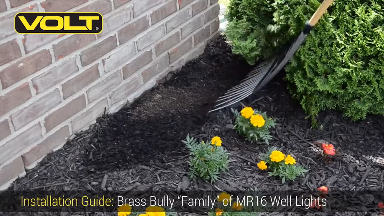 rake back mulch and place fixture